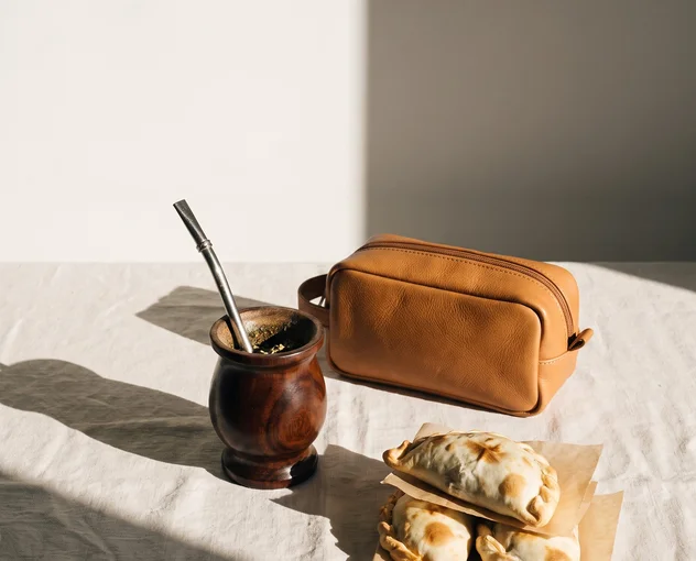 Mate gourd, leather travel pouch and empanadas from AA Polo's Lifestyle & Gifts collection